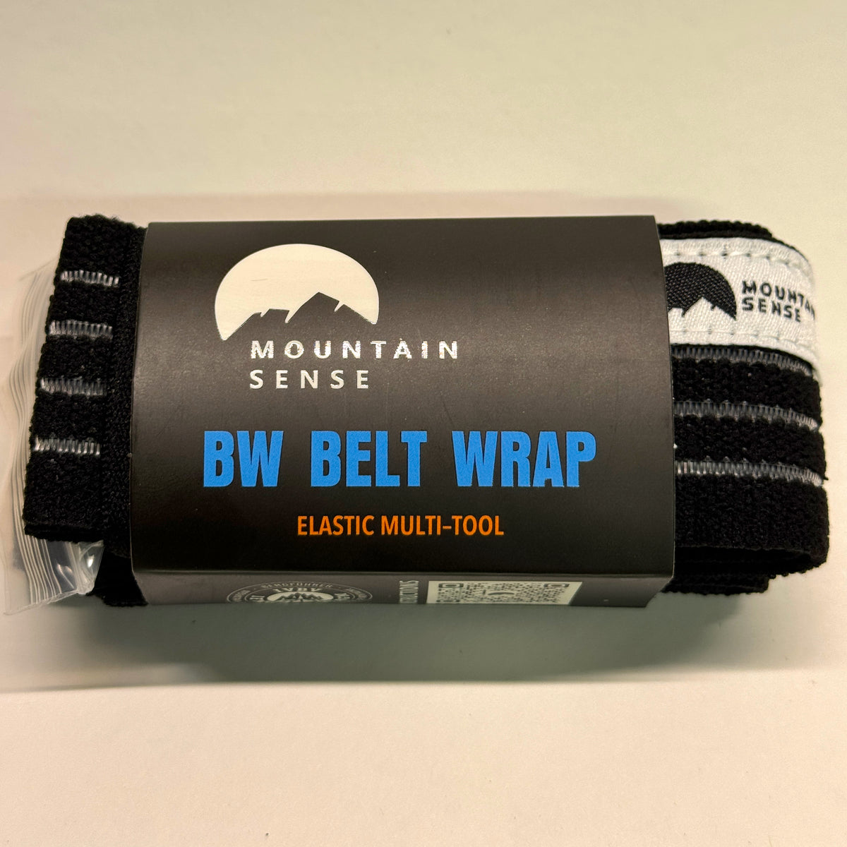 BW Belt Wrap in Mountain Sense packaging, labeled elastic multi-tool