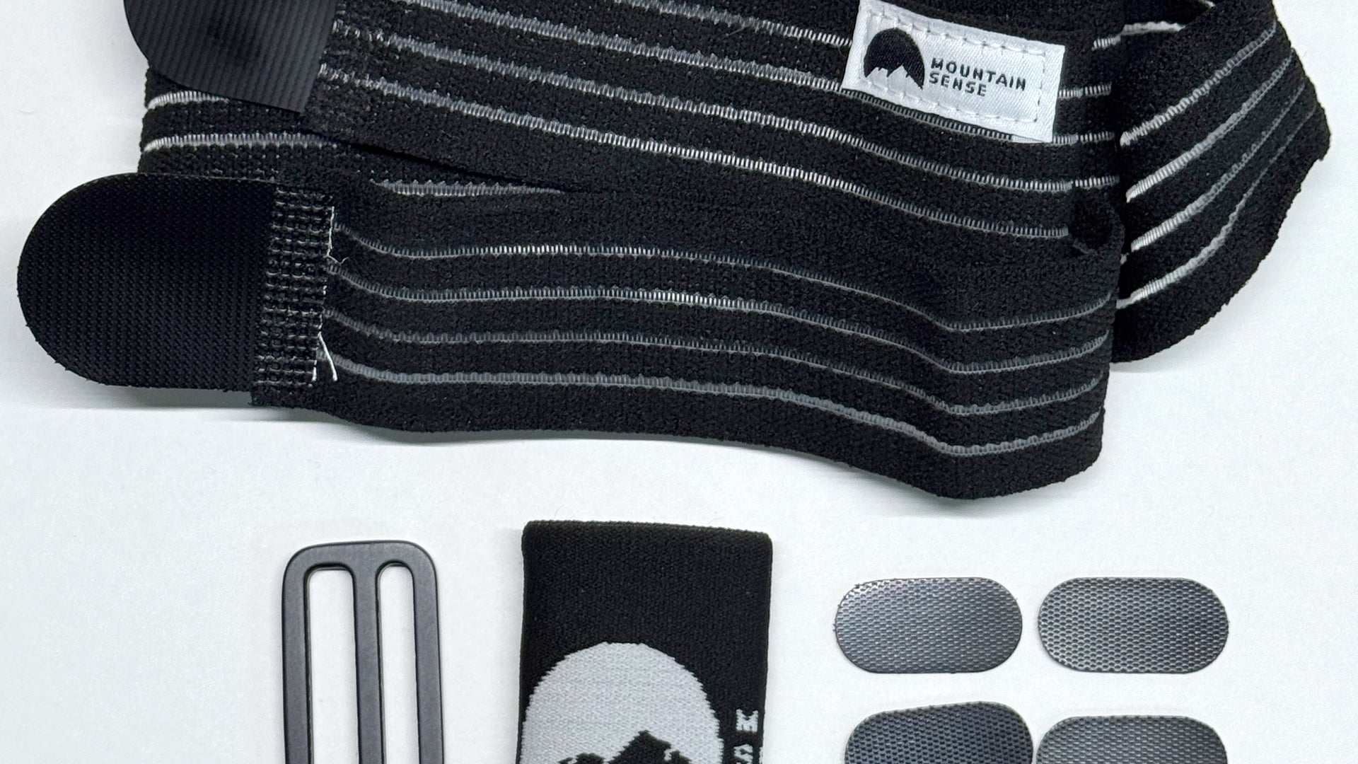 BW Belt Wrap elastic band with Velcro ends, aluminum G-Hook buckle, logo keeper and four spare Velcro patches