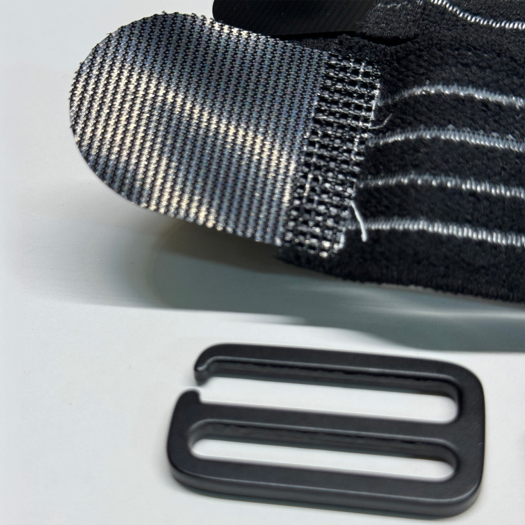 Close-up of the BW Belt Wrap's Velcro end tab and black G-Hook buckle