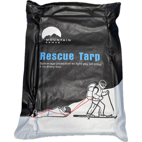 Bruce Wayne Rescue Tarp in its packaging, illustrated with a skier towing an injured partner across snow