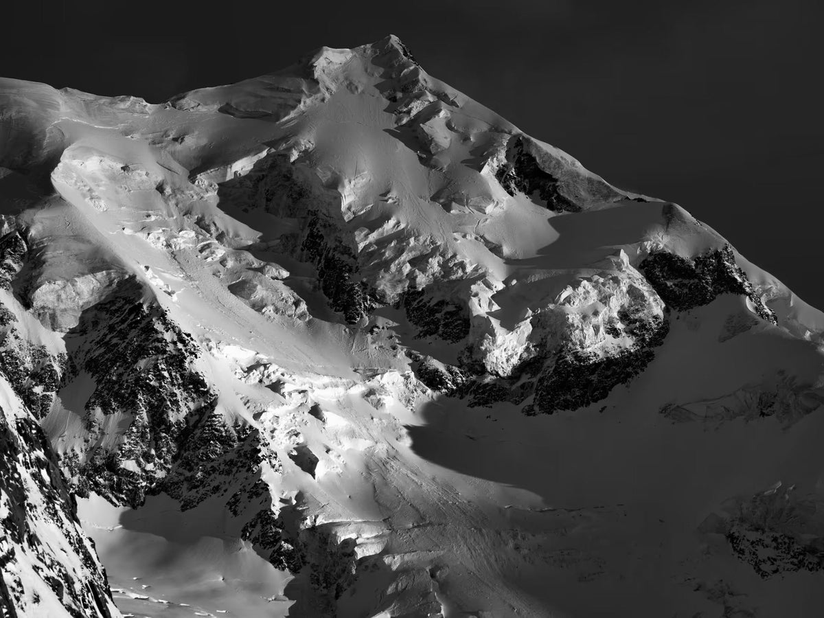 Black and white glaciated peak at dusk, hero image for the nine course MTN Sense bundle