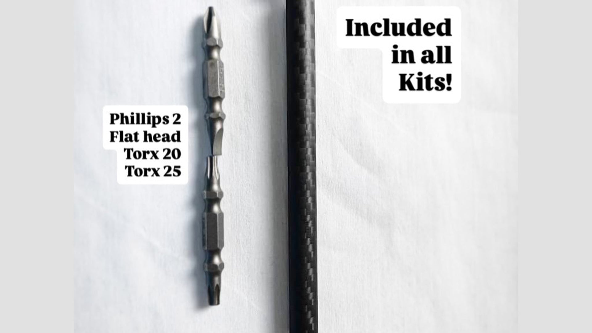 Carbon fiber handle mini ratchet beside its double-ended bits: Phillips 2, flat head, Torx 20 and Torx 25