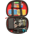 Backcountry Rescue Kit 2.0 open in its hard case, red lining packed with nitrile gloves, hemostatic gauze, multitool and ratchet
